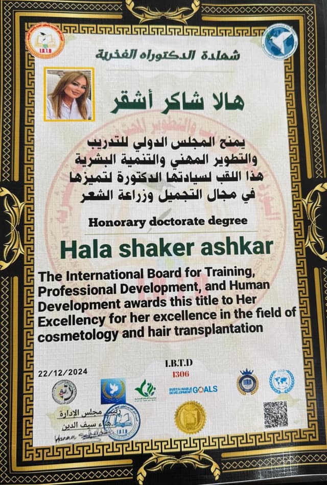Dr. Hala Ashkar receiving hair transplant excellence award